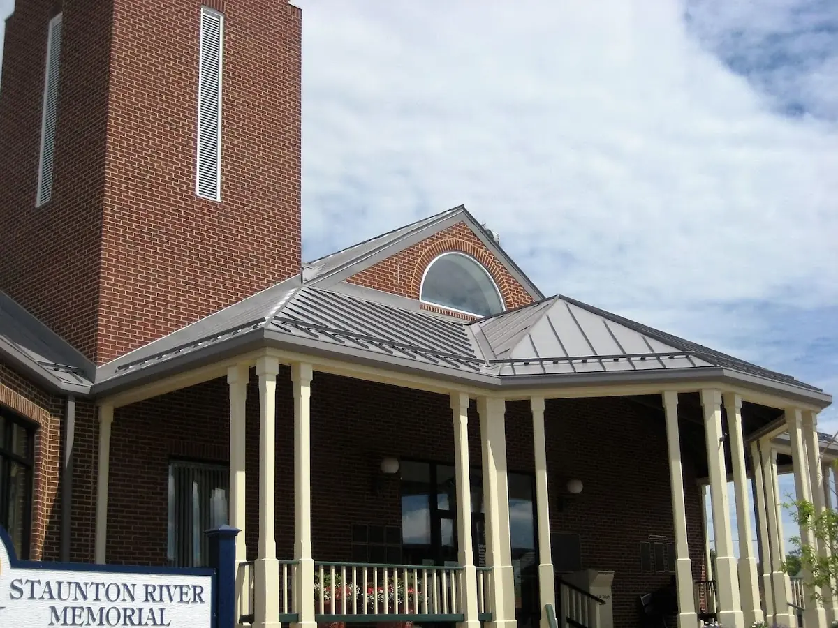 Skilled roofing craftsmen working on a residential roof in East Stroudsburg